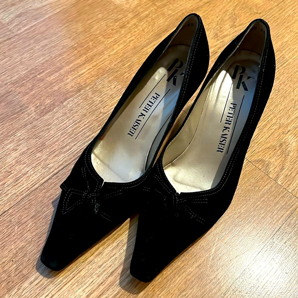 Peter Kaiser black suede pumps featuring a pointed toe and a small bow.